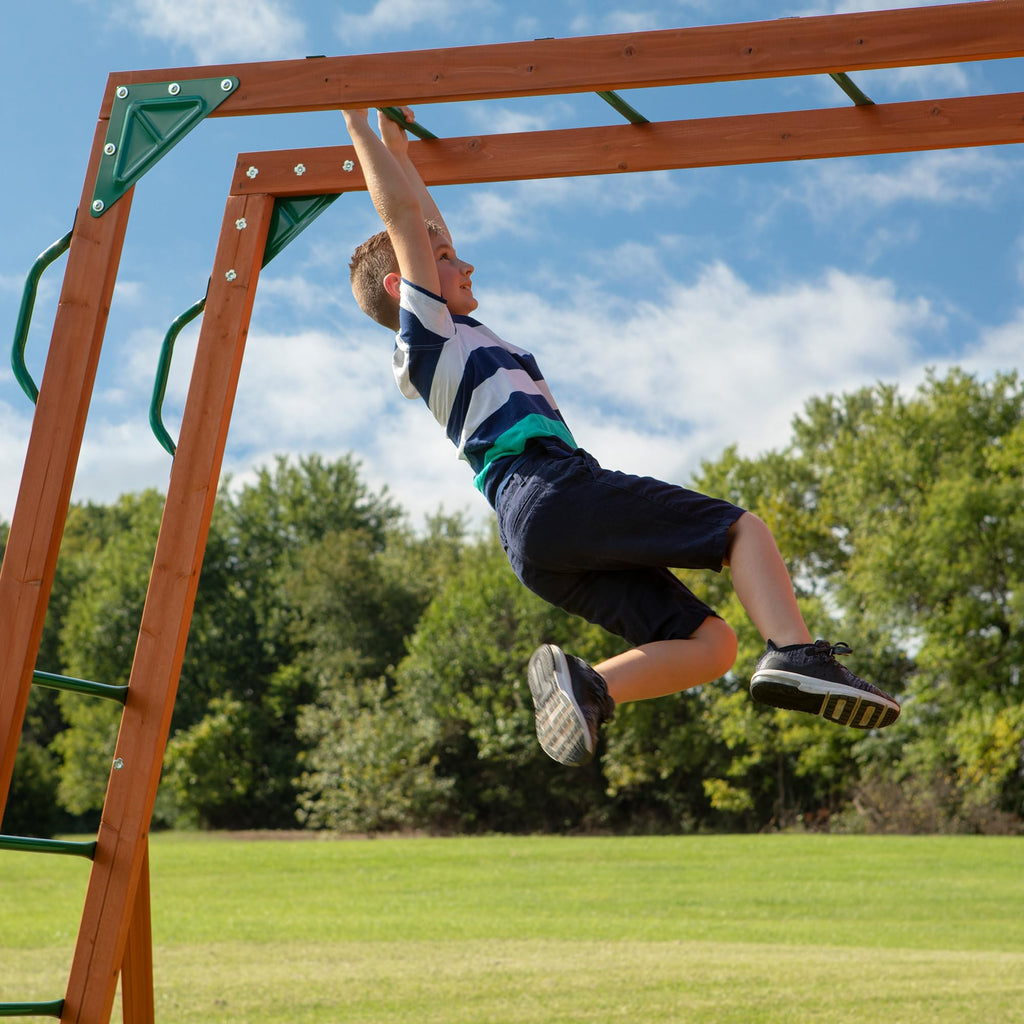Backyard Discovery Skyfort II Cedar Wood Swing Set with Wave Slide, Raised Clubhouse, Crow's Nest, Monkey Bars, Balcony, Belt Swings, Trapeze, Rock Wall, Picnic Table, Sandbox, Ladder, Outdoor Playset