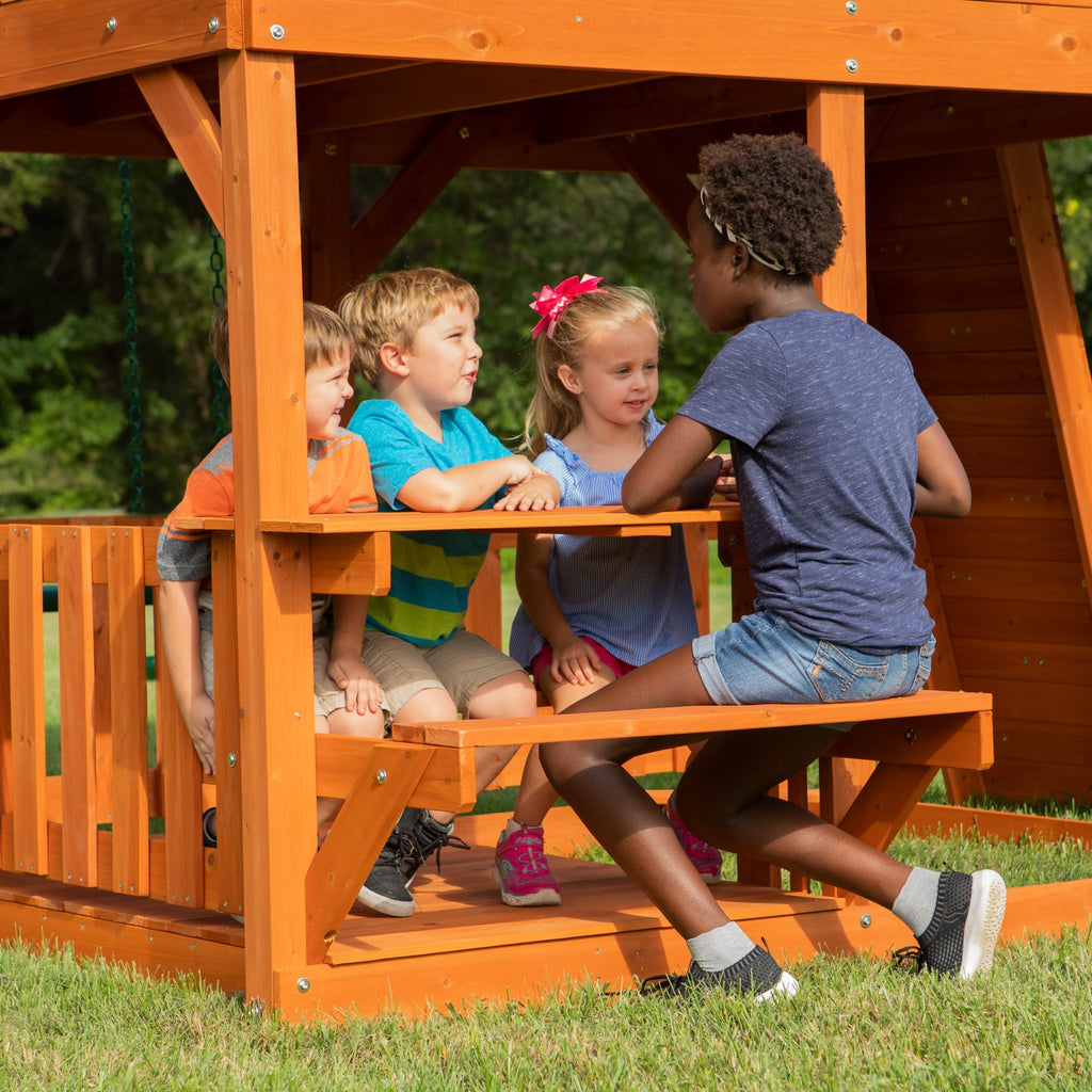 Backyard Discovery Skyfort II Cedar Wood Swing Set with Wave Slide, Raised Clubhouse, Crow's Nest, Monkey Bars, Balcony, Belt Swings, Trapeze, Rock Wall, Picnic Table, Sandbox, Ladder, Outdoor Playset