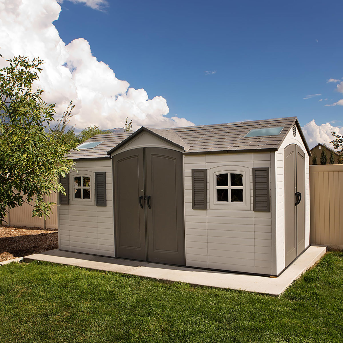 Lifetime 15×8 Ft Dual‑Entry Outdoor Storage Shed, Steel‑Reinforced, UV‑Protected, Weather‑Resistant Backyard Garden Shed with Skylights, Windows & Shelving, Desert Sand