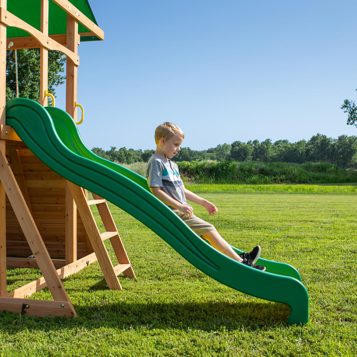 Backyard Discovery Mount Mckinley Cedar Wood Swing Set with Wave Slide, Play Deck, Double Rock Wall, Rope Ladder, Web Swing, Belt Swings, Toy Telescope, Steering Wheel, Sandbox Area, Outdoor Playset